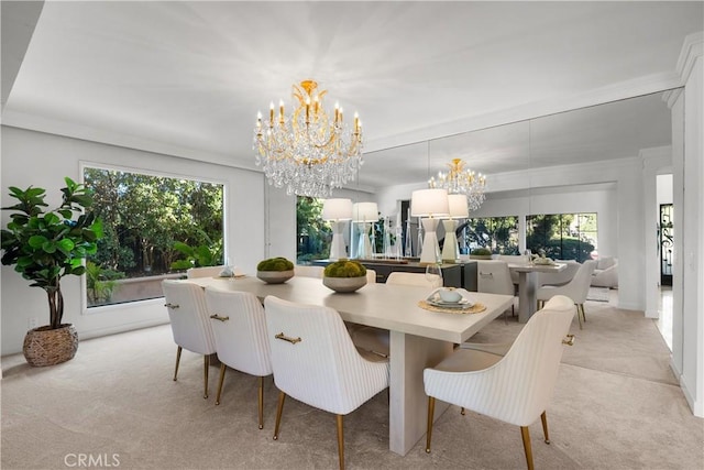 dining space with light carpet and a chandelier