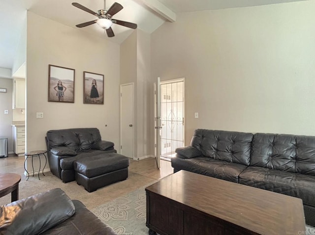 living area featuring high vaulted ceiling, beamed ceiling, and a ceiling fan