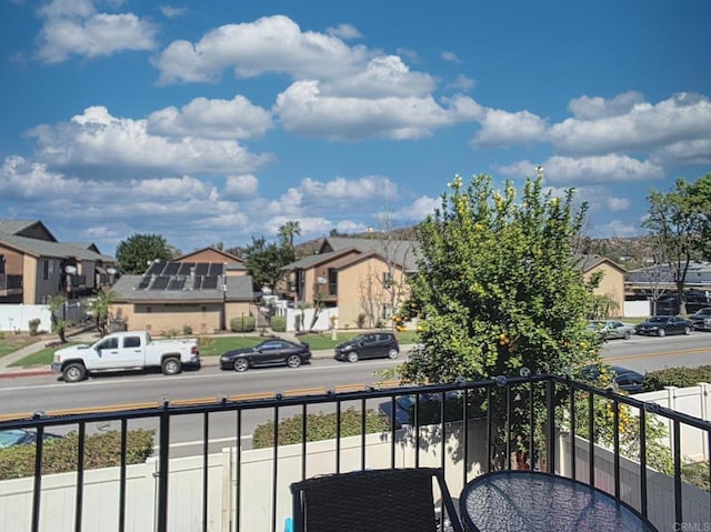 balcony featuring a residential view