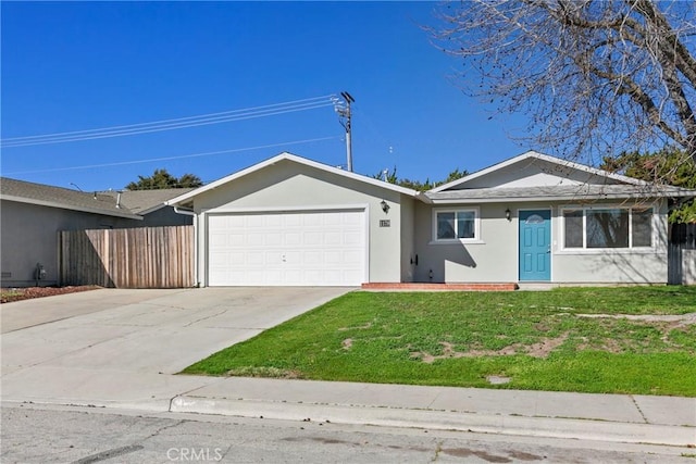 ranch-style house featuring an attached garage, a front yard, and stucco siding