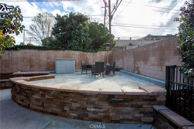 view of patio with a fenced backyard