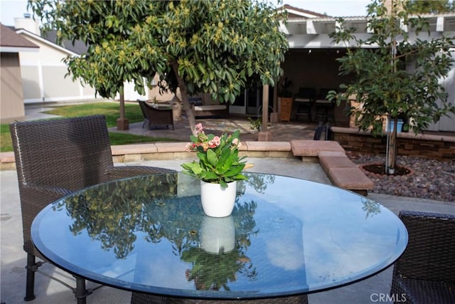 surrounding community with a patio area