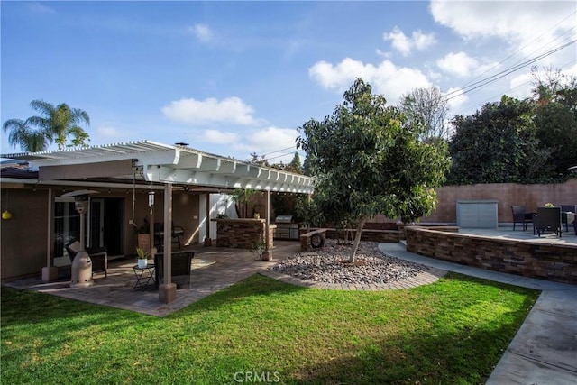 view of yard featuring a patio area, fence, and a pergola