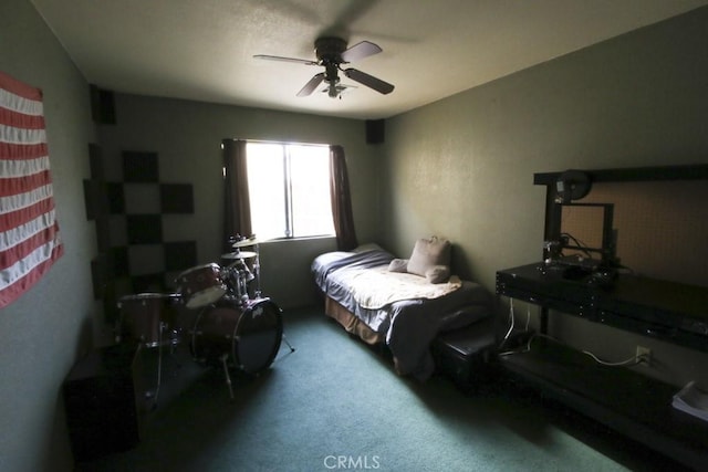 bedroom featuring carpet flooring and a ceiling fan