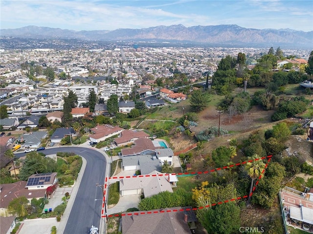 bird's eye view featuring a residential view and a mountain view