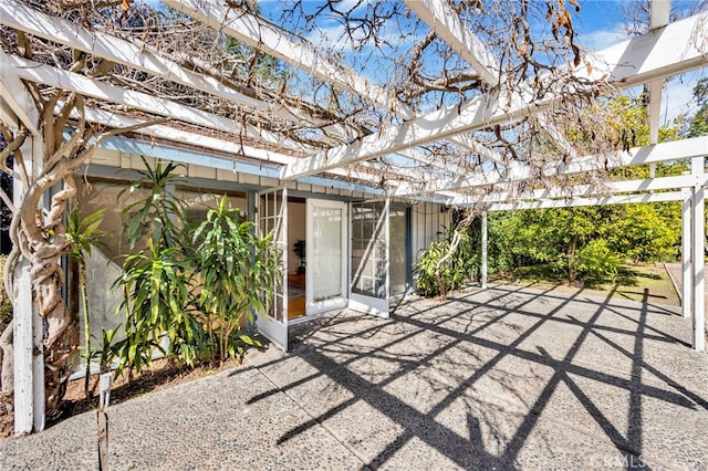 view of patio featuring a pergola