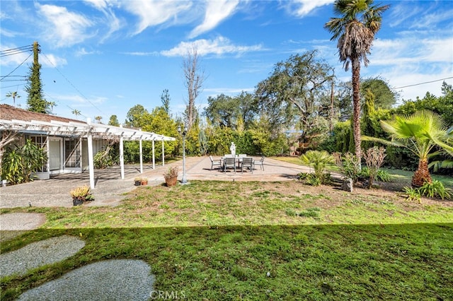 view of yard with a patio area and a pergola