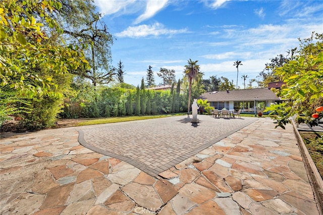 view of patio with outdoor dining area