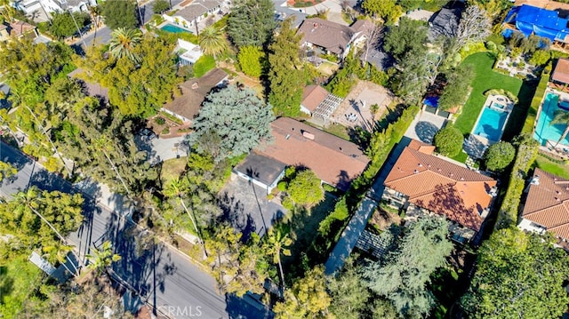 birds eye view of property with a residential view