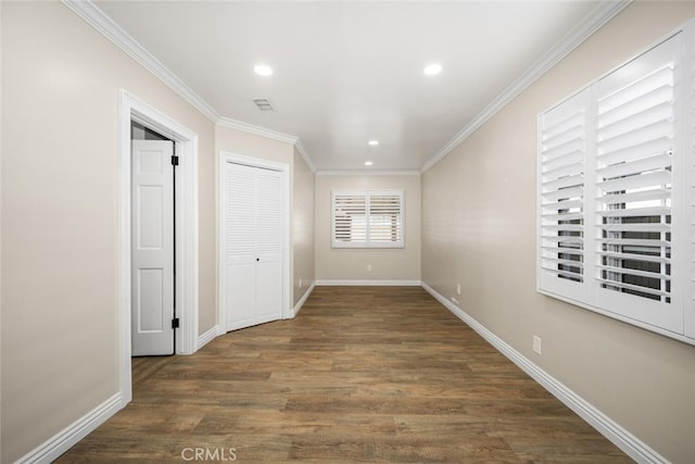 unfurnished room with recessed lighting, baseboards, dark wood-style flooring, and ornamental molding