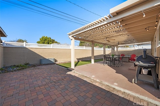 view of patio / terrace featuring outdoor dining space, a fenced backyard, and a pergola