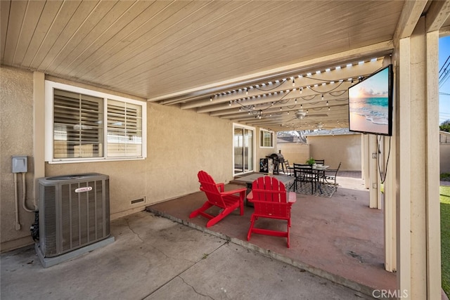 view of patio / terrace featuring outdoor dining space and central air condition unit