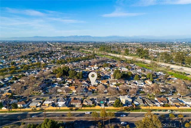 birds eye view of property featuring a residential view and a mountain view