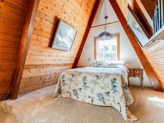 carpeted bedroom with vaulted ceiling and wooden walls