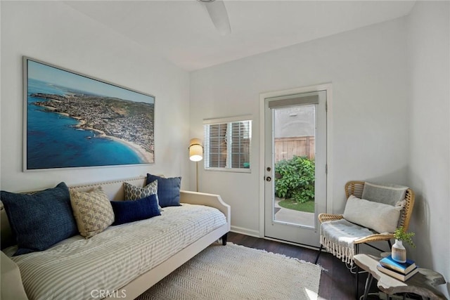 interior space featuring ceiling fan and dark wood finished floors