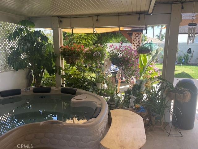 view of patio with a jacuzzi