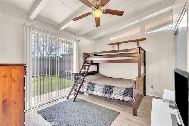 bedroom with lofted ceiling with beams, access to outside, ceiling fan, and light wood-type flooring