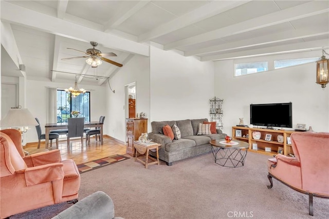 carpeted living area featuring lofted ceiling with beams, ceiling fan with notable chandelier, tile patterned flooring, and baseboards