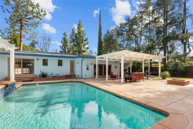 back of property with a fenced in pool, fence, an outdoor hangout area, and a pergola