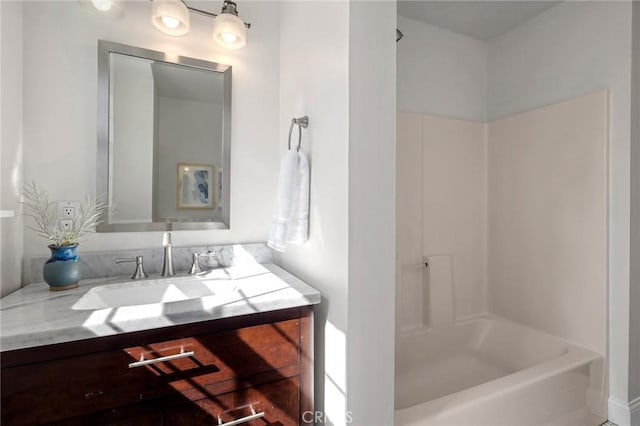 bathroom featuring a shower, a bathtub, and vanity