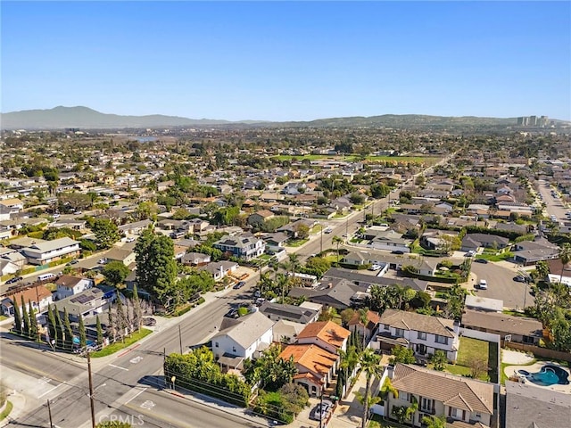 birds eye view of property featuring a residential view and a mountain view