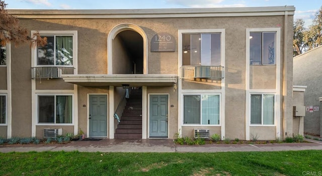 view of property featuring stucco siding