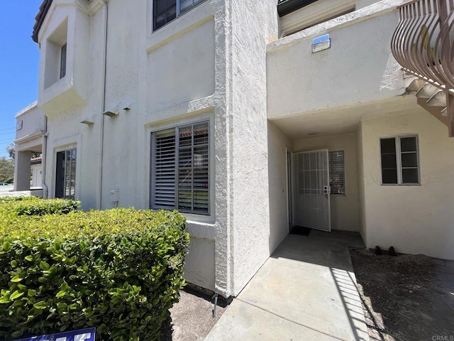 750 Eastshore Ter Unit 120, Chula Vista, CA 91913 - view of exterior entry with stucco siding