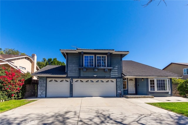 traditional-style house featuring concrete driveway, stone siding, and a tiled roof