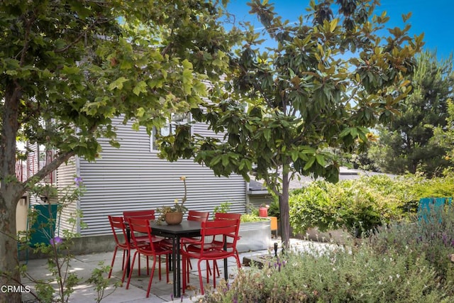 view of patio with outdoor dining space