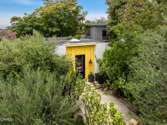 exterior space featuring stucco siding