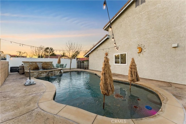 view of swimming pool featuring a patio area, a fenced backyard, and a fenced in pool