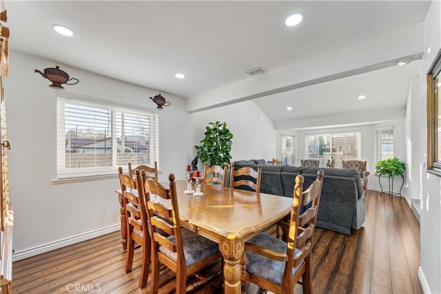 dining room with baseboards, dark wood finished floors, and recessed lighting