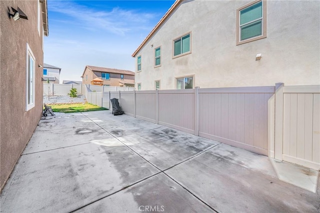 view of patio featuring a fenced backyard