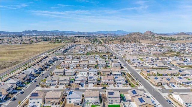 birds eye view of property with a residential view and a mountain view