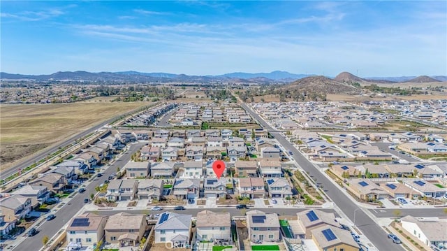 bird's eye view with a residential view and a mountain view