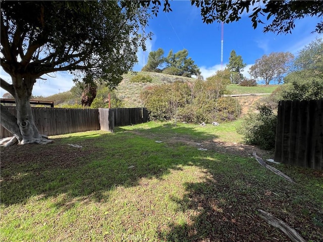 view of yard with fence