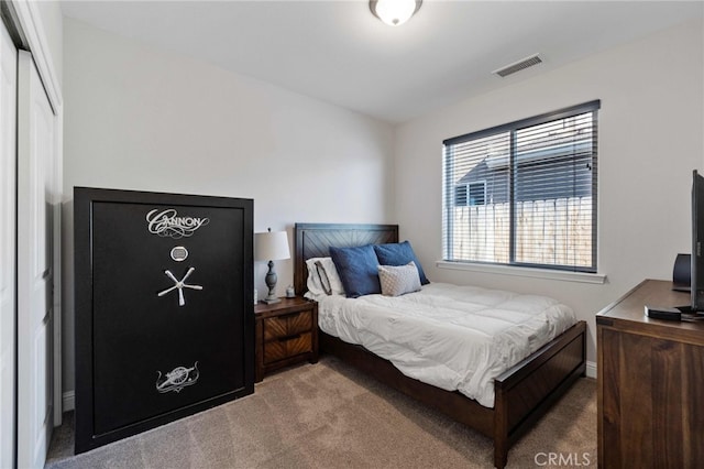 bedroom featuring carpet floors and visible vents