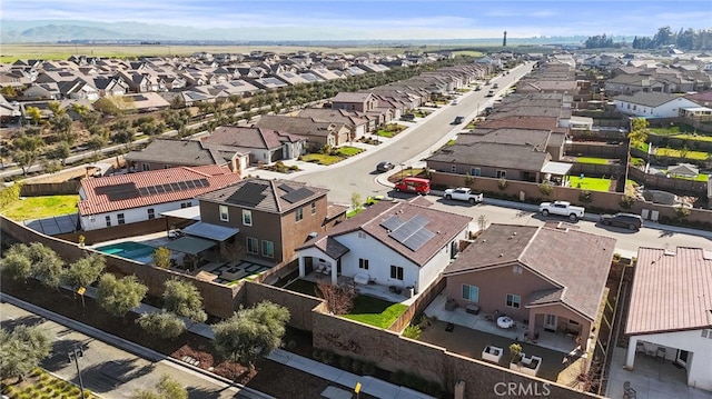 aerial view with a mountain view and a residential view