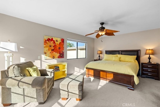 bedroom with carpet floors and a ceiling fan