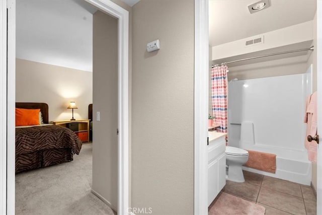 ensuite bathroom with visible vents, toilet, shower / tub combo, connected bathroom, and tile patterned flooring