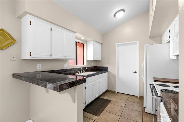 kitchen featuring tile countertops, a peninsula, a sink, white cabinetry, and white electric range oven