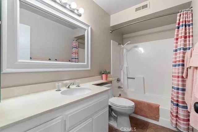 full bath featuring visible vents, toilet, shower / bath combo with shower curtain, vanity, and tile patterned floors