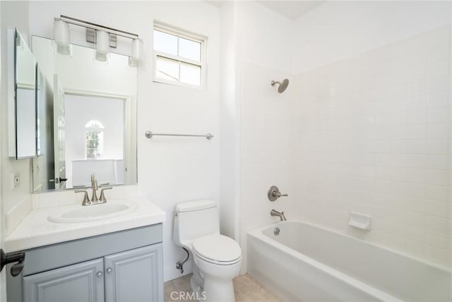 bathroom featuring a wealth of natural light, shower / bath combination, vanity, and toilet