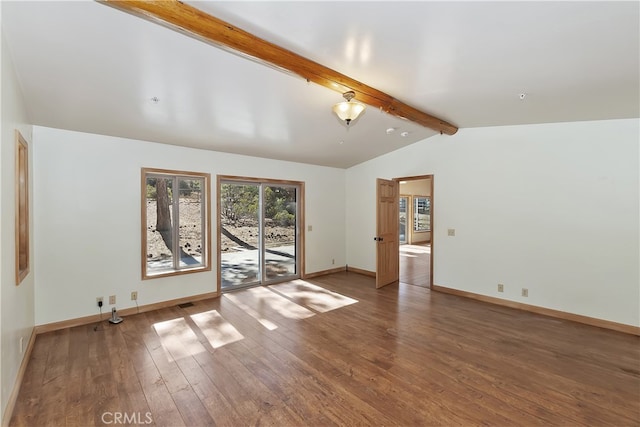 spare room with vaulted ceiling with beams, baseboards, and dark wood finished floors