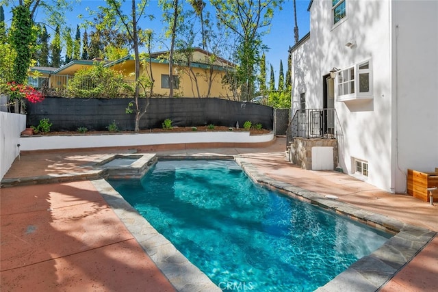 view of swimming pool with a fenced backyard and a fenced in pool