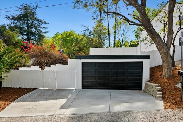 garage featuring fence