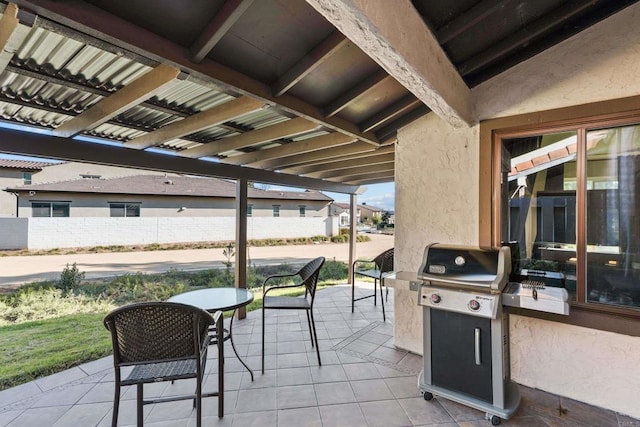 view of patio / terrace with area for grilling, outdoor dining area, and grilling area