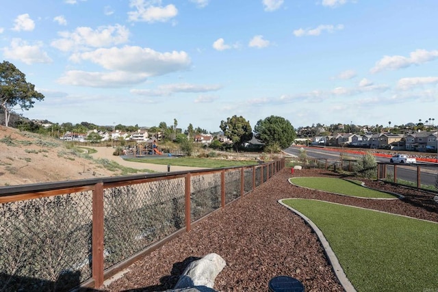 surrounding community featuring fence