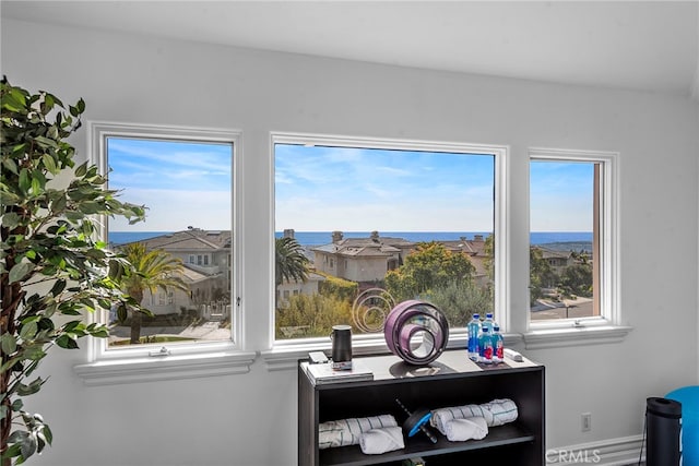 office featuring a water view and plenty of natural light