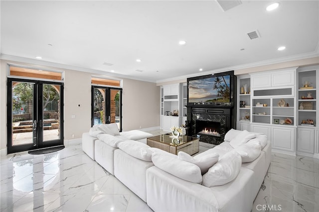 living area with french doors, marble finish floor, visible vents, ornamental molding, and a high end fireplace